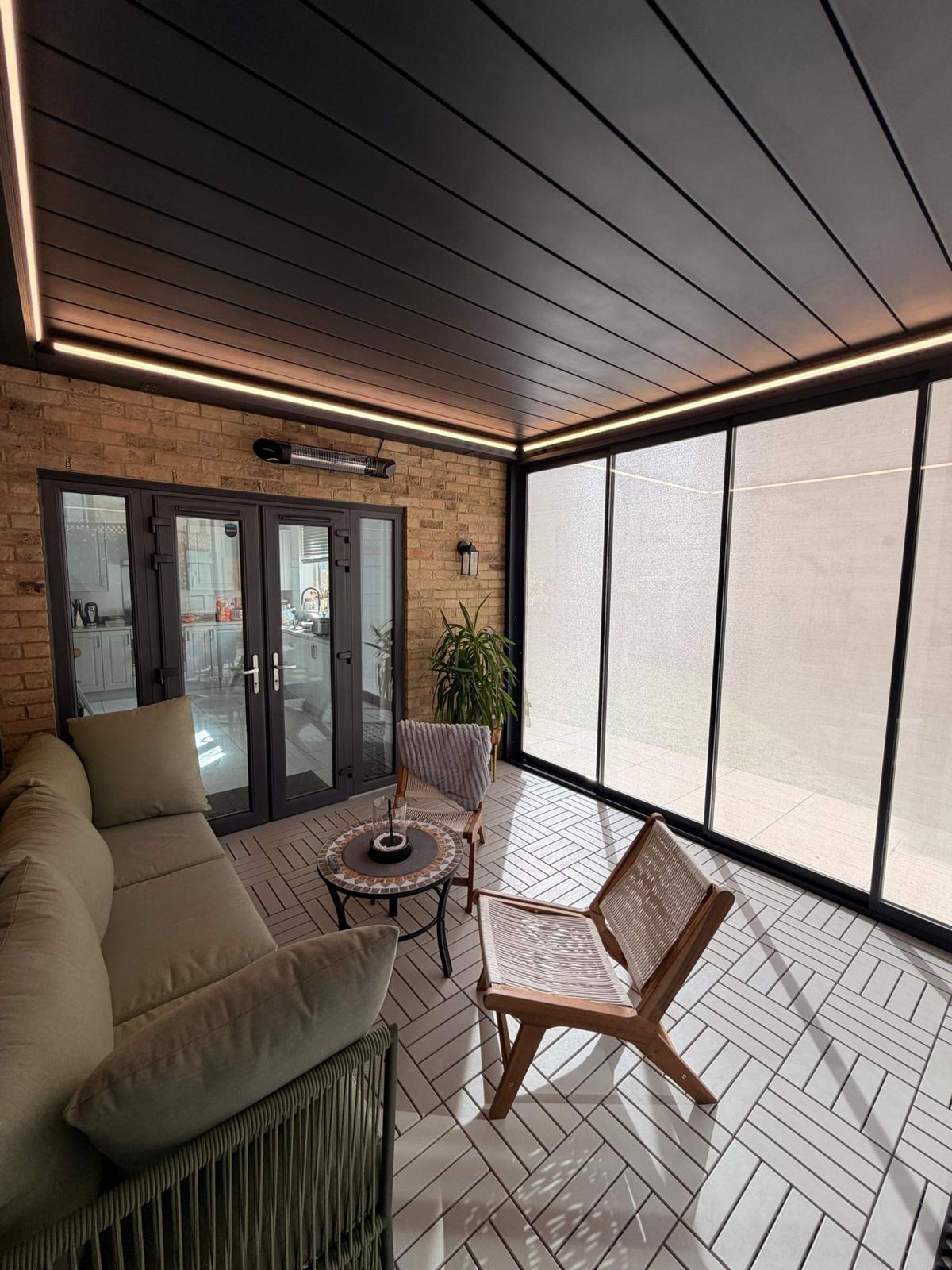 Outdoor room interior with integrated perimeter lighting