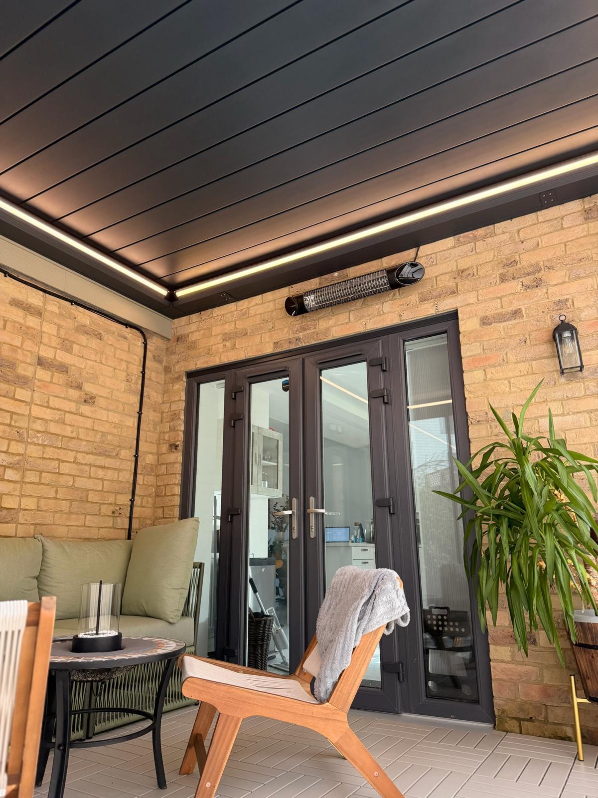 Detail of the outdoor room roof structure with integrated perimeter lighting